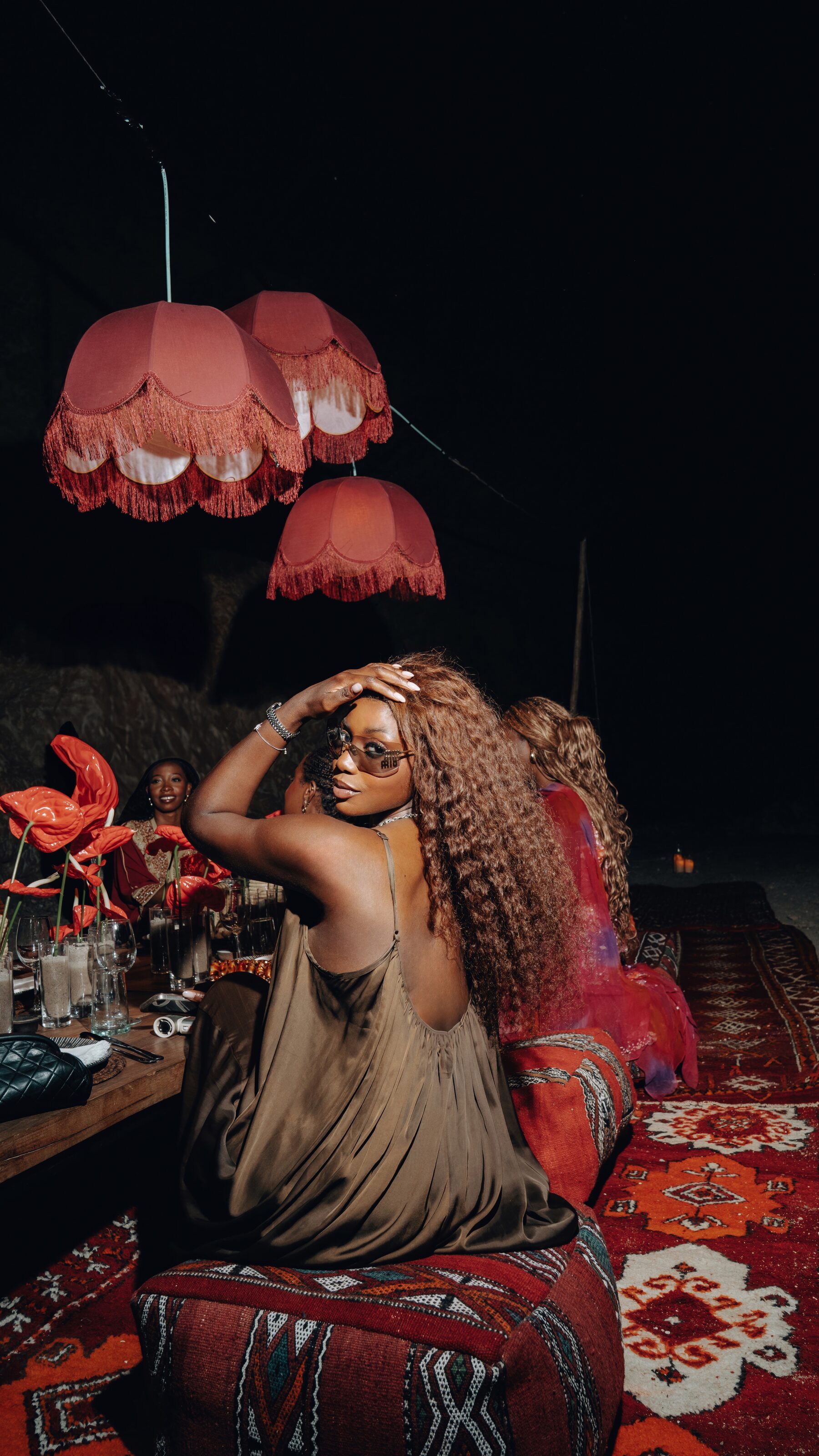 Bedouin night dinner with red lanterns in the Agafay desert